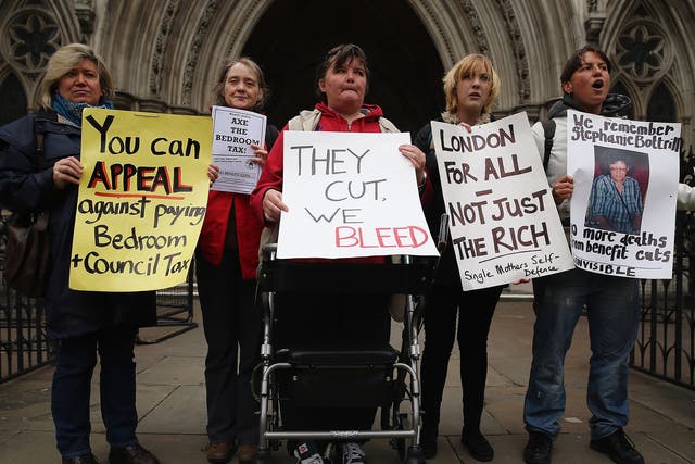 Demonstrators gathered to protest against government changes to the welfare system and the proposed 'Bedroom Tax' in 2013