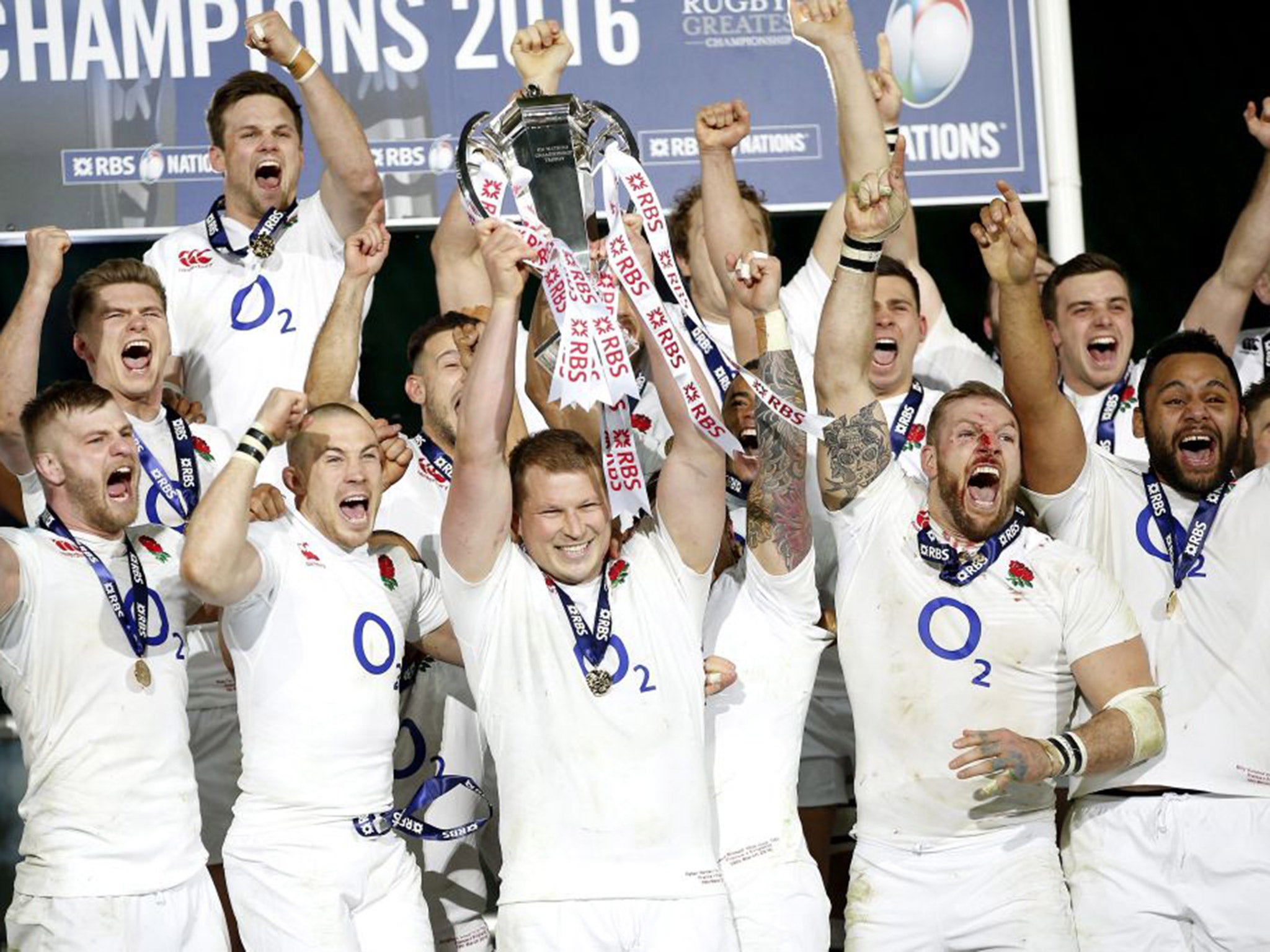 Dylan Hartley lifts the Six Nations trophy after England complete the Grand Slam