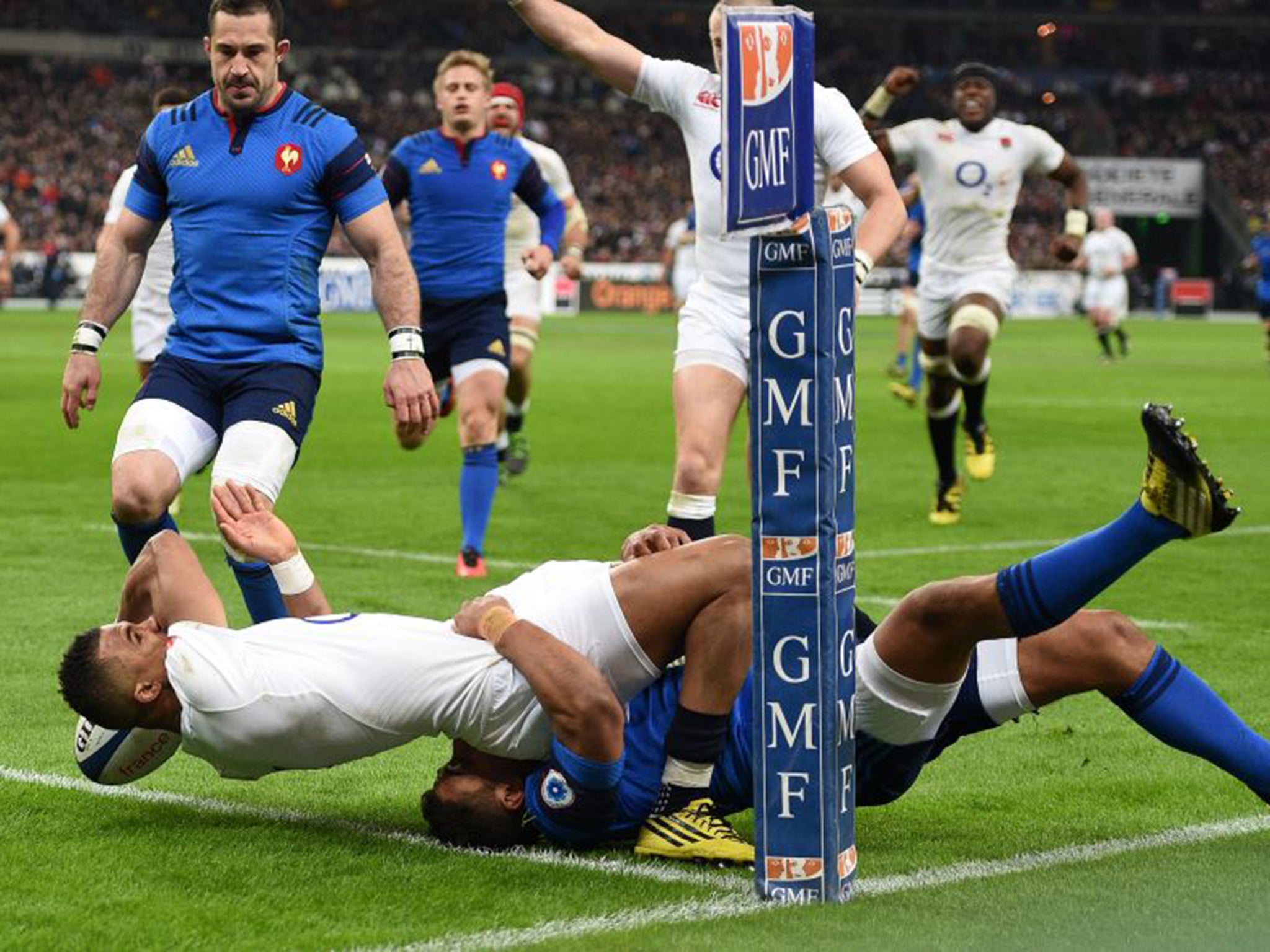 Winger Anthony Watson gets on the end of Ben Youngs’ grubber kick to score England’s third try at Stade de France