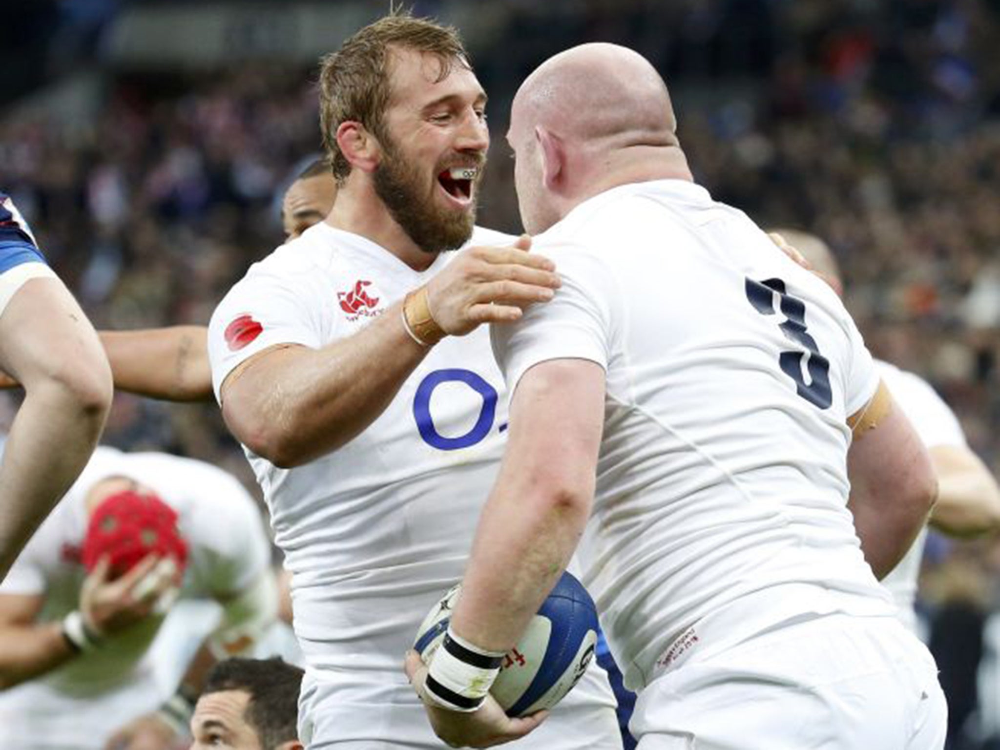 Chris Robshaw congratulates Dan Cole on scoring his try in Paris