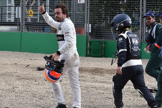 Fernando Alonso walks away from the crash