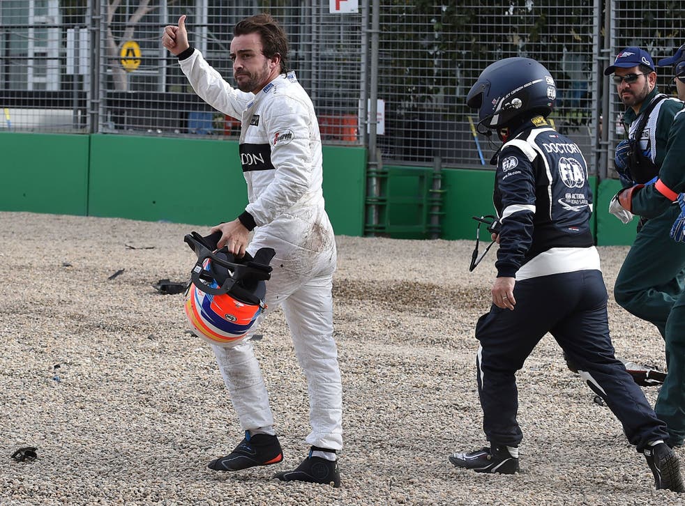 Fernando Alonso walks away from the crash