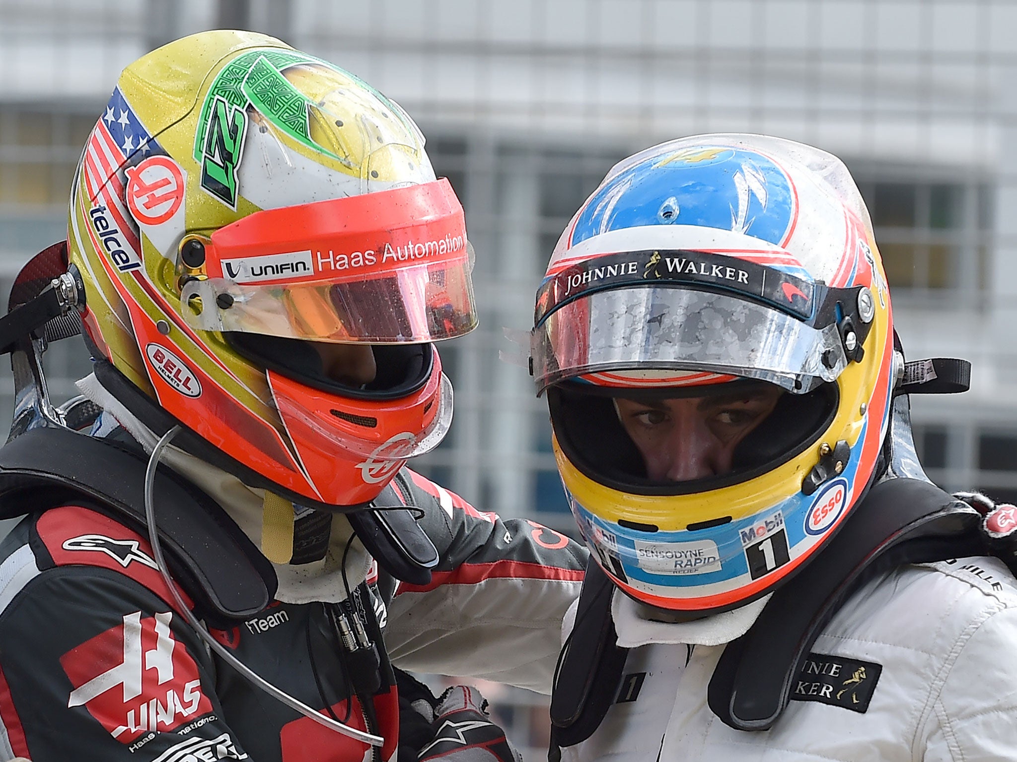 Fernando Alonso with Esteban Gutierrez