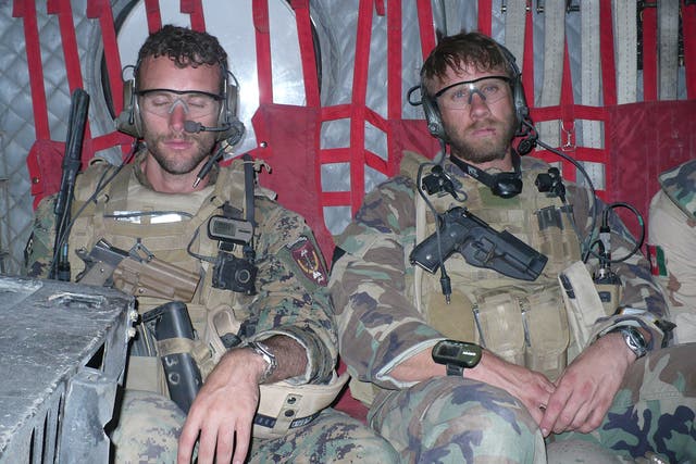 Brothers in arms: Elliot Ackerman, left, with ‘Dave’ on special ops in Afghanistan, where they advised and fought with Tajik tribesmen.