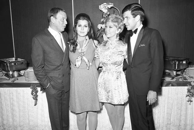 Frank Sinatra and his three children, Tina, Nancy and Frank Jnr at Caesars Palace, Las Vegas, in 1968.