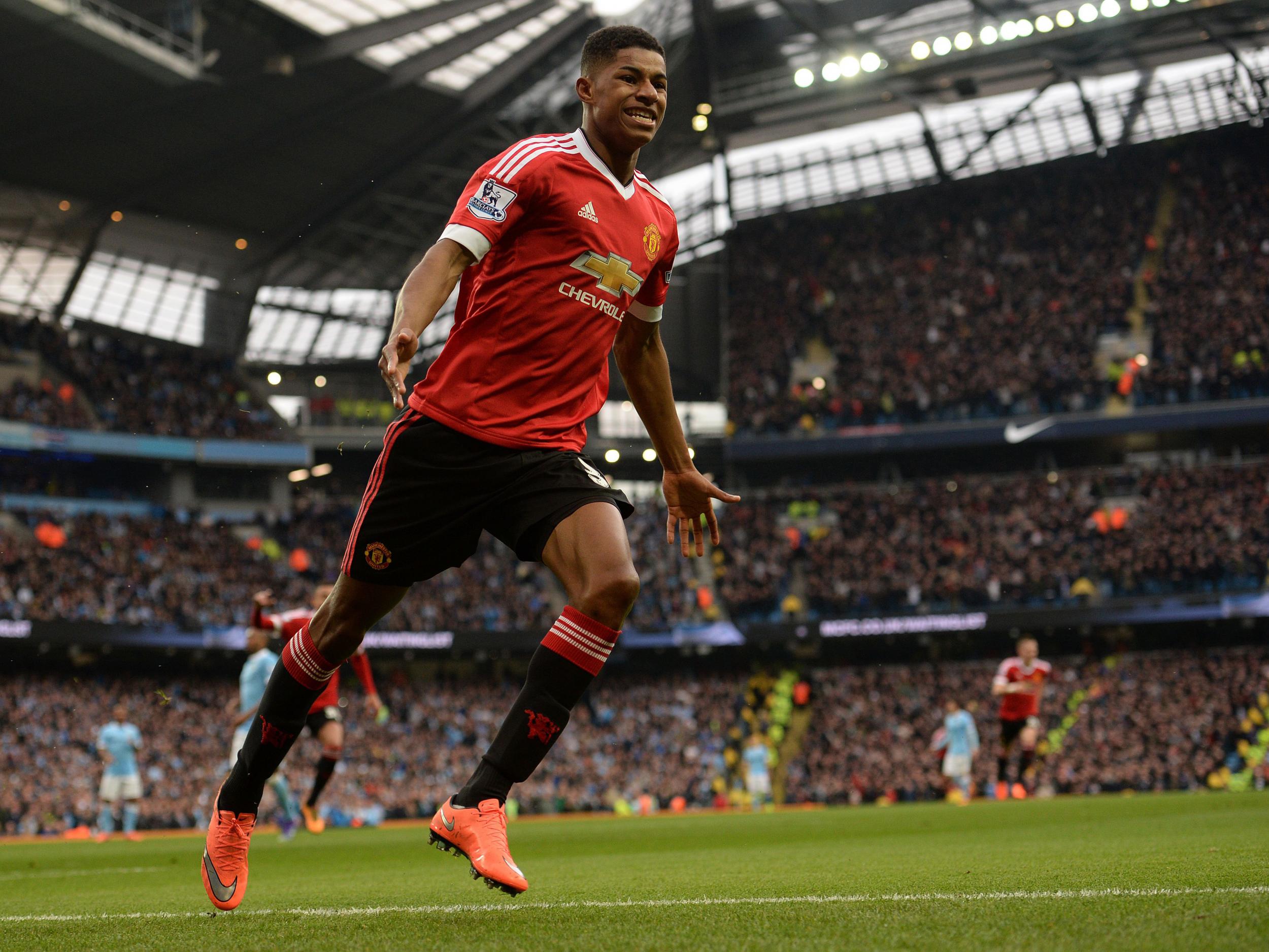 Marcus Rashford scores for Manchester United at the home of bitter foes City