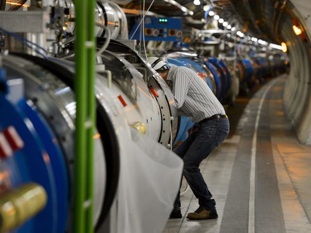 A scientist at Cern’s Large Hadron Collider, which in 2012 proved the existence of the Higgs boson