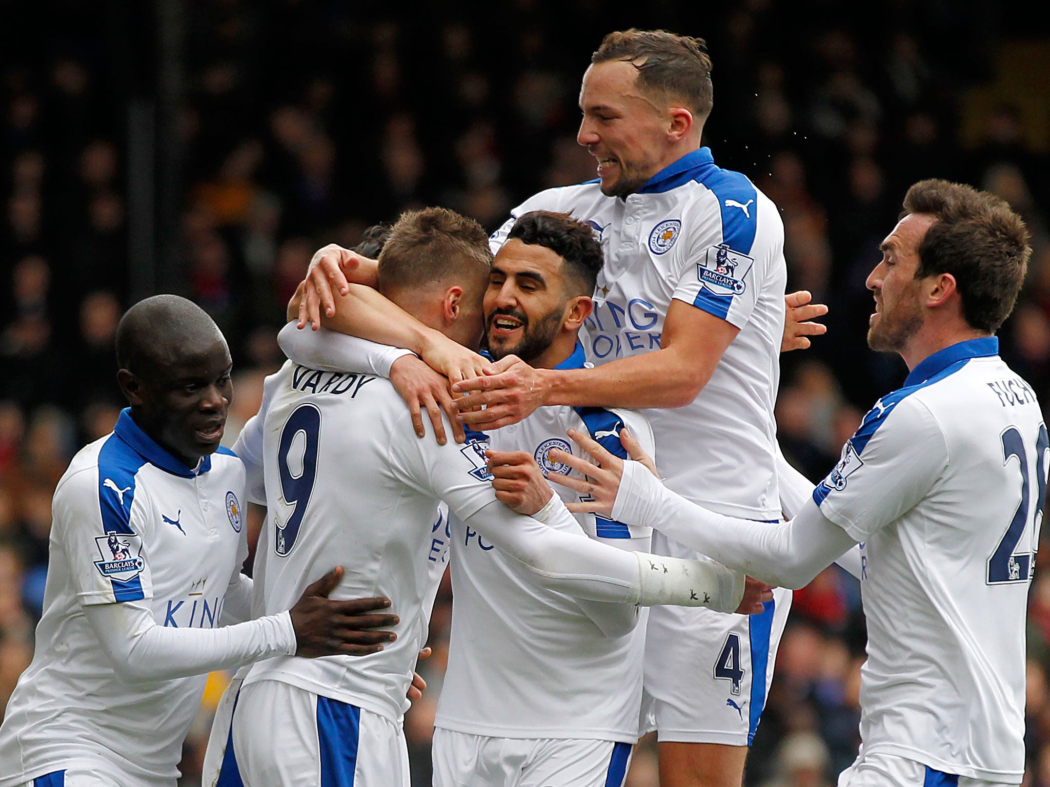 Riyad Mahrez is congratulated by his team-mates after scoring against Crystal Palace