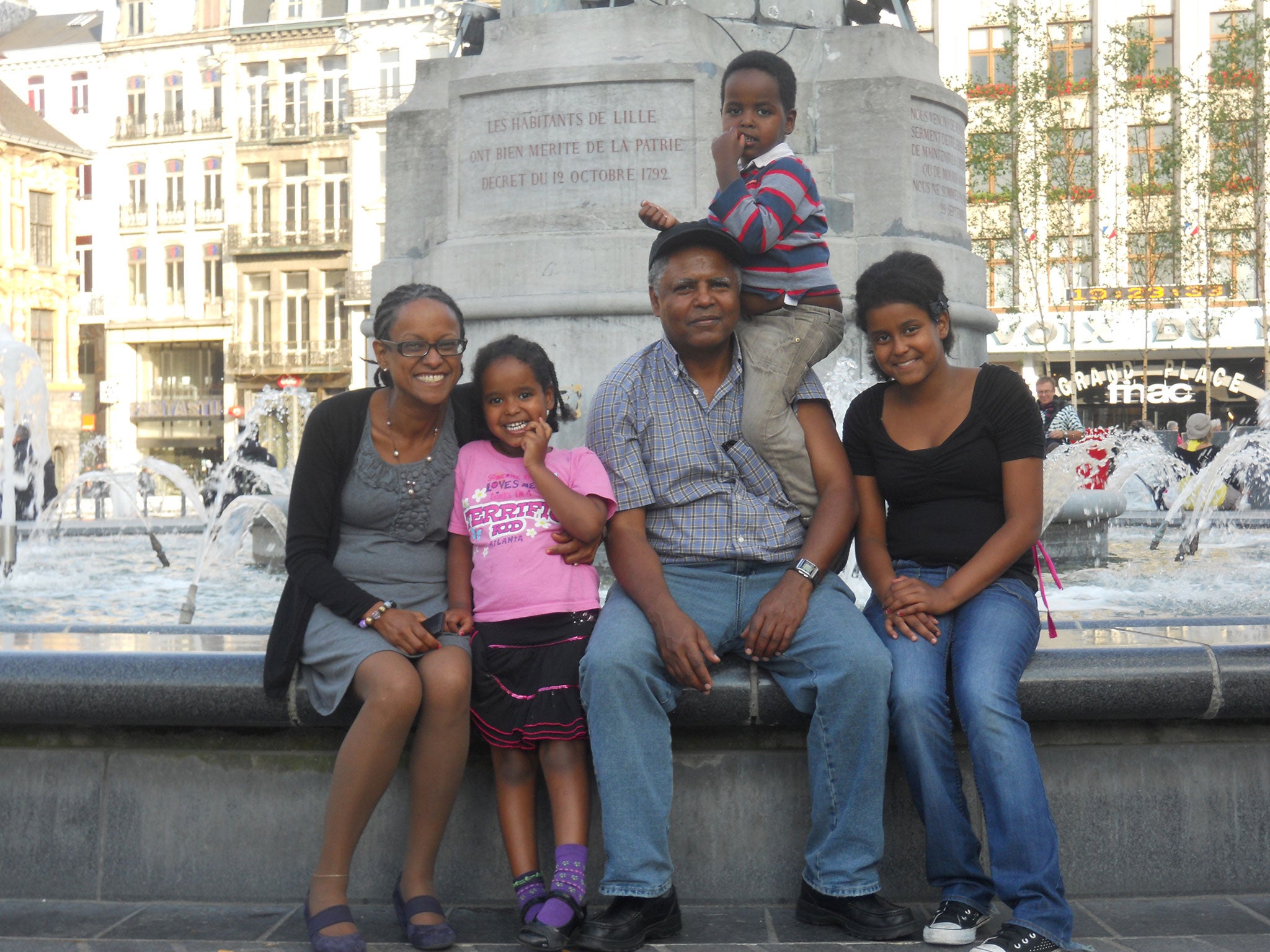 Andy Tsege with his partner, Yemi Hailemariam, and their three children