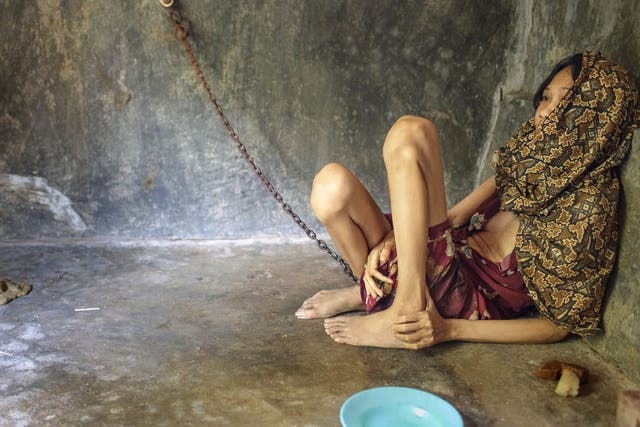A woman left chained in a room in East Java