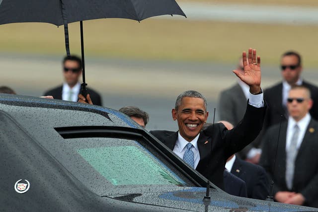 US President Barack Obama waves after his arrival on Jose Marti Airport in Havana, Cuba