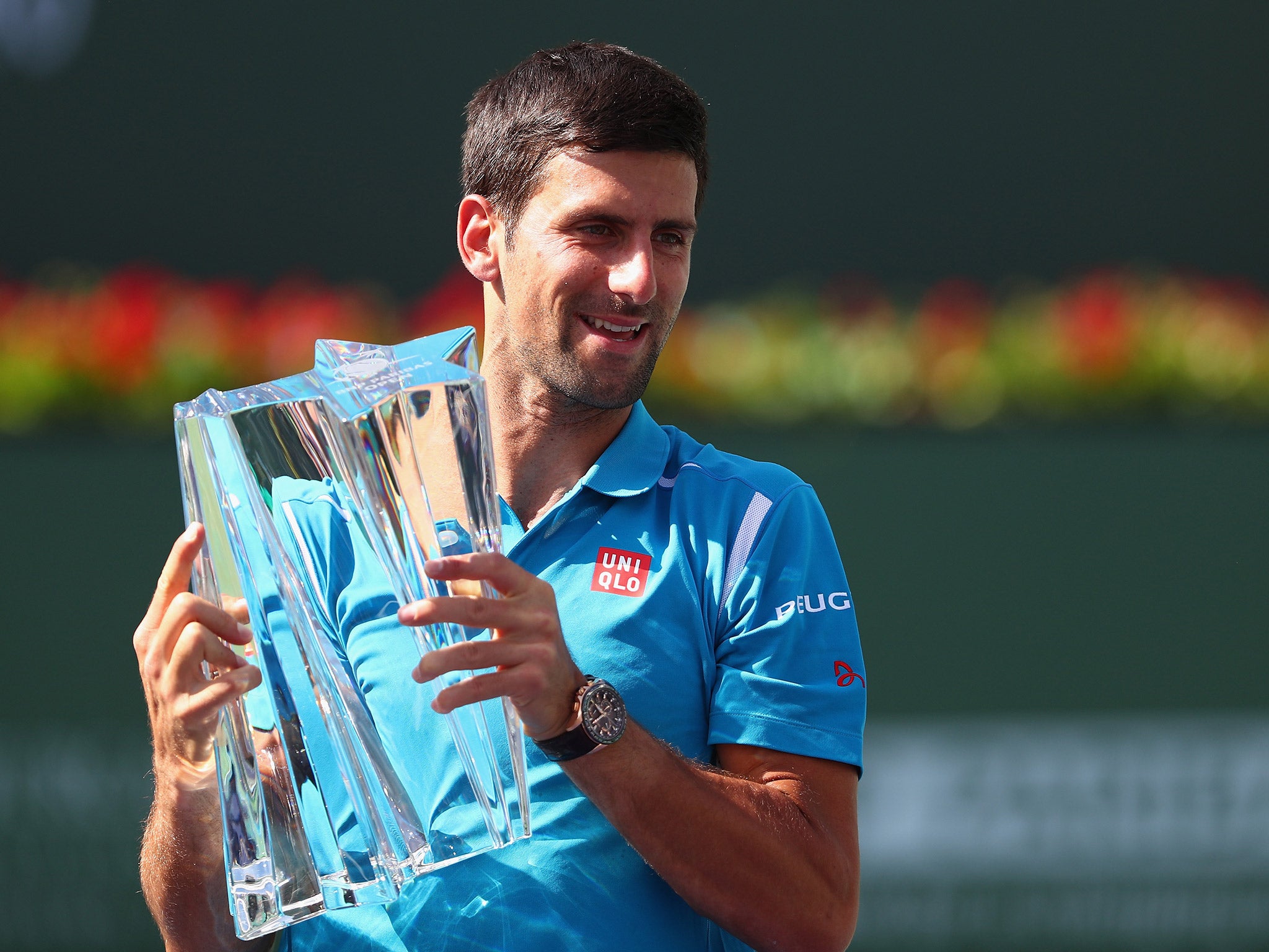 Novak Djokovic celebrates winning the BNP Paribas Open final