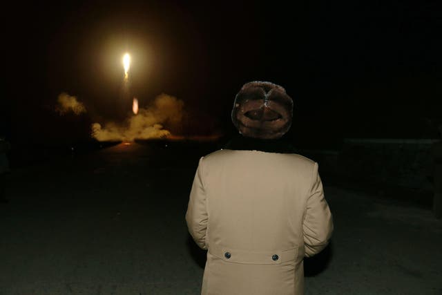 (File Photo) North Korean leader Kim Jong-un, watching a ballistic missile launch drill in an undisclosed location
