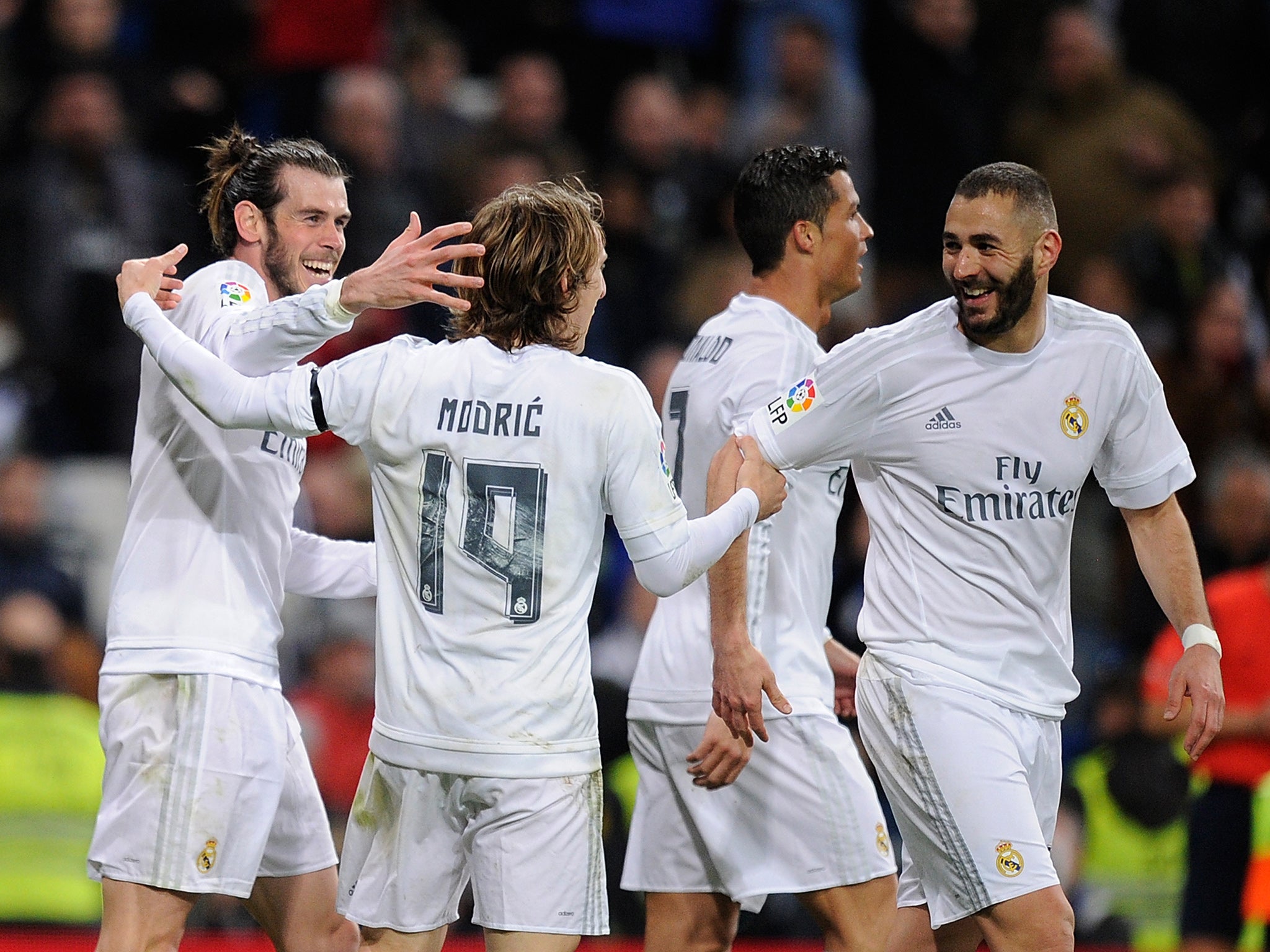 Real Madrid forward Gareth Bale celebrates with his team-mates