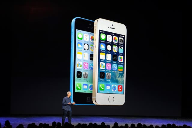Tim Cook speaks during an Apple event to announce the iPhone 6 and the iPhone 6 Plus at the Flint Center in Cupertino, California, September 9, 2014.