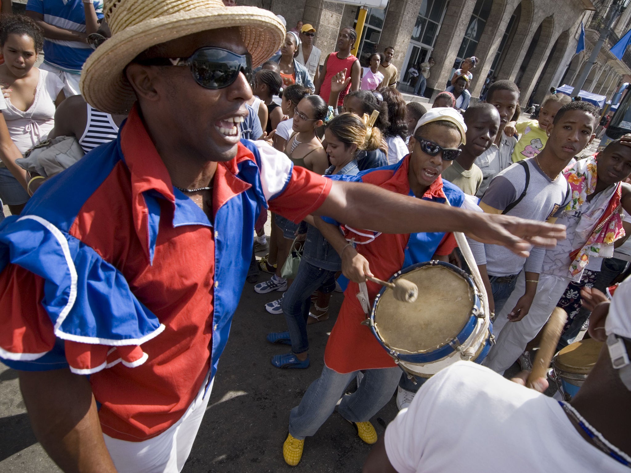 Afrocuban carnival group "Los componedores de batea" performing in the streets of La Habana Vieja