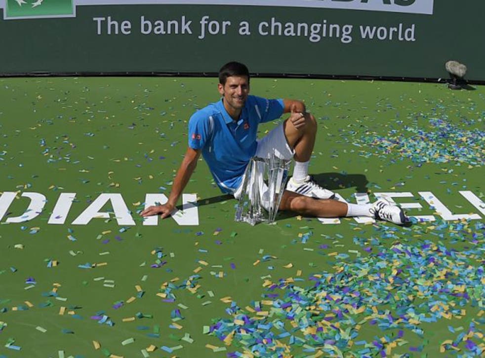 World No 1 Novak Djokovic celebrates winning the Indian Wells tournament on Sunday but is under fire for his outspoken views on equal pay