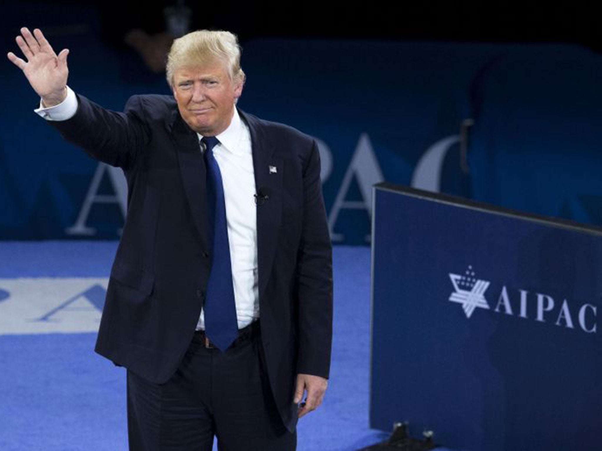 Donald Trump waves at the crowd following his address to the American Israel Public Affairs Committee (AIPAC) in Washington