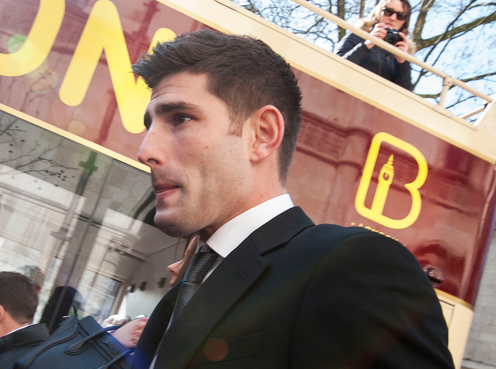 Footballer Ched Evans outside the High Court, London, where his conviction for raping a 19-year-old woman is to be reviewed