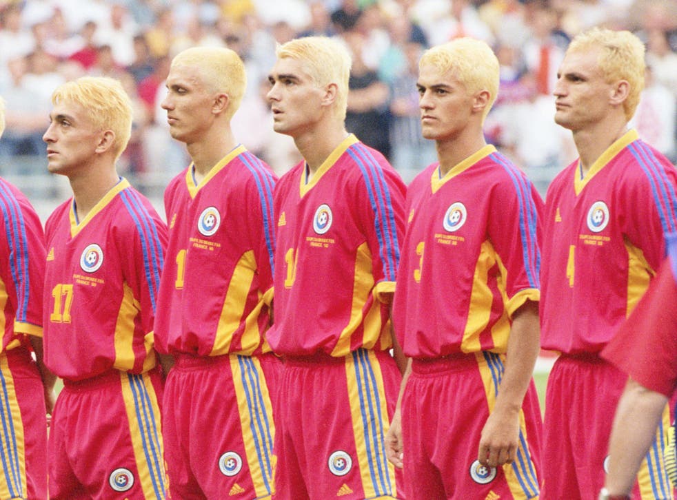 The bleach-blonde Romanian football team lines up before their match against Tunisia during the 1998 World Cup