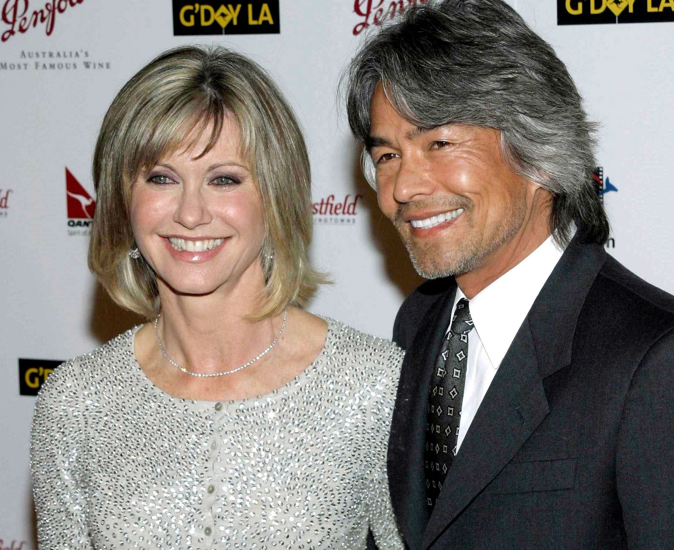 Olivia Newton John And Husband LYUYPB