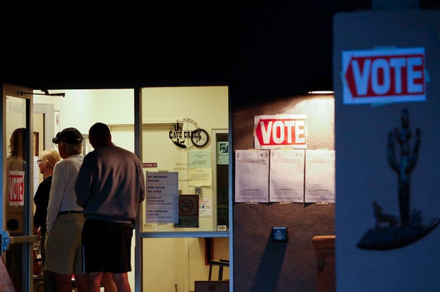 Early voters line up in Arizona on Tuesday morning.