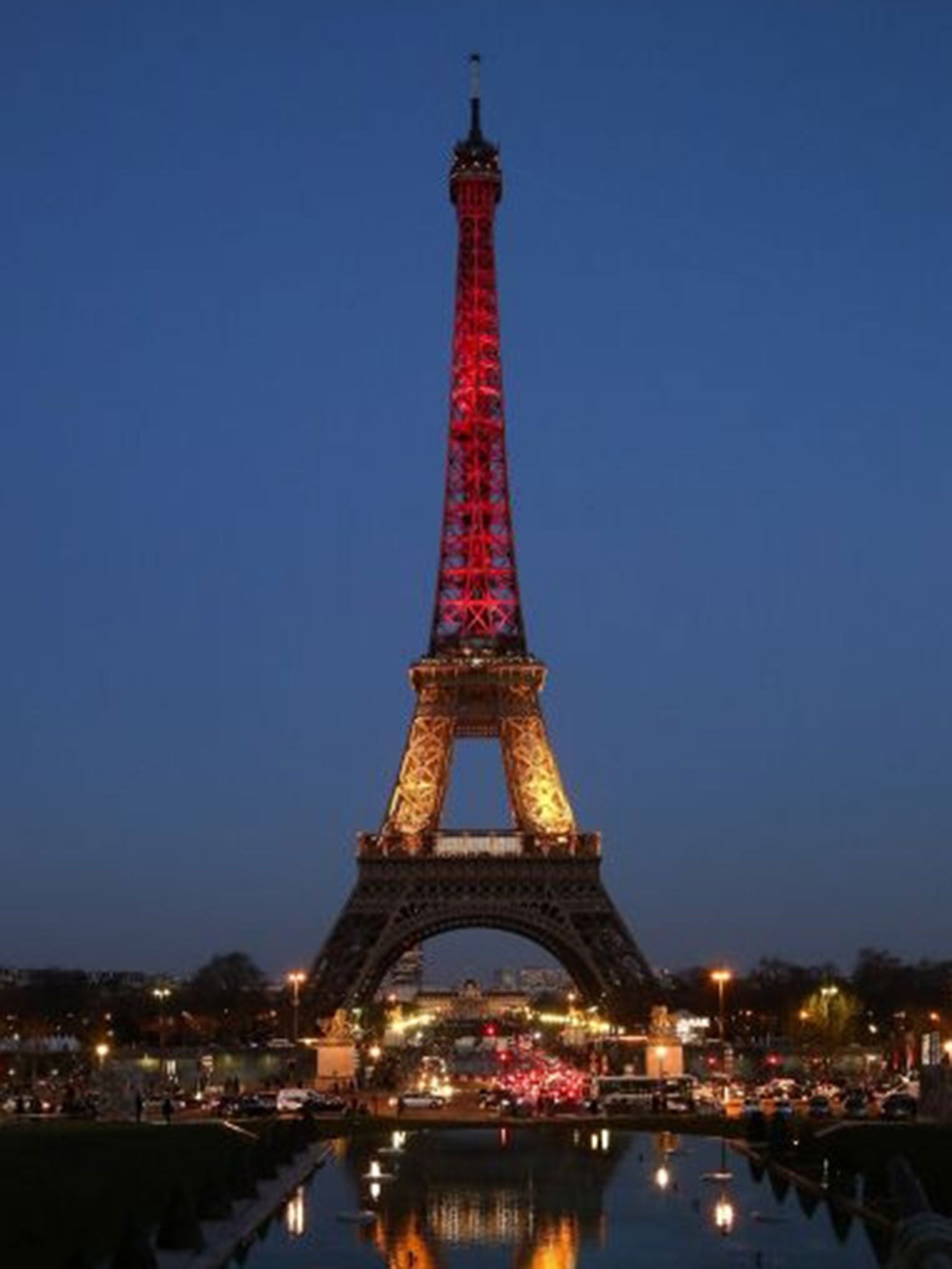 The Eiffel Tower is illuminated with the Belgium national colours