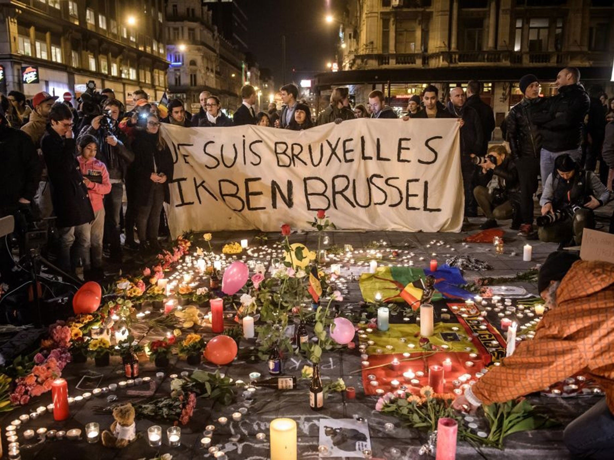 The march was due to take place in Place de la Bourse, which became an improvised memorial of chalk messages, tea lights and flowers after the Brussels attacks