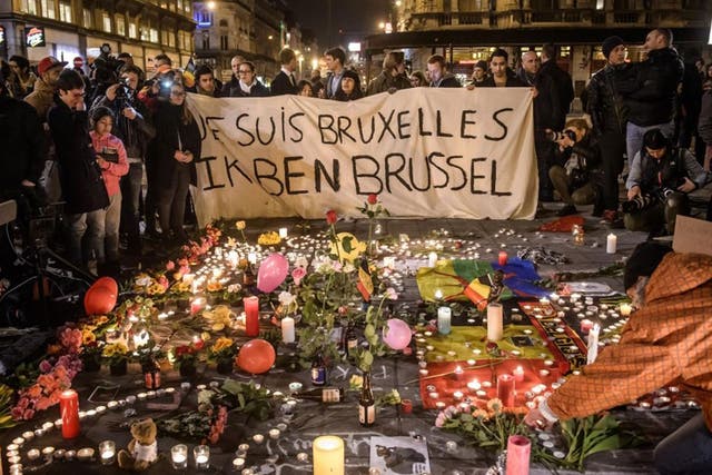 The march was due to take place in Place de la Bourse, which became an improvised memorial of chalk messages, tea lights and flowers after the Brussels attacks