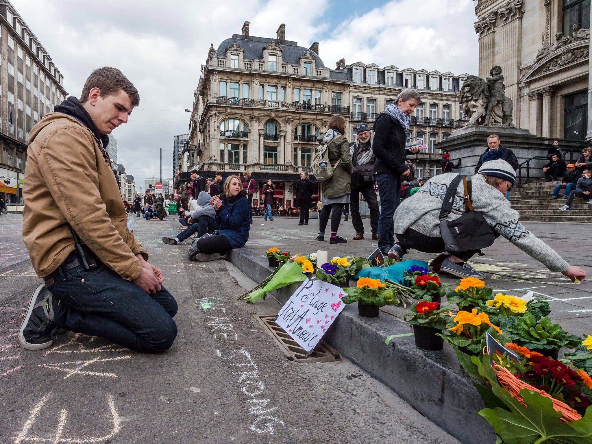 Messages and floral tributes outside the Brussels stock exchange