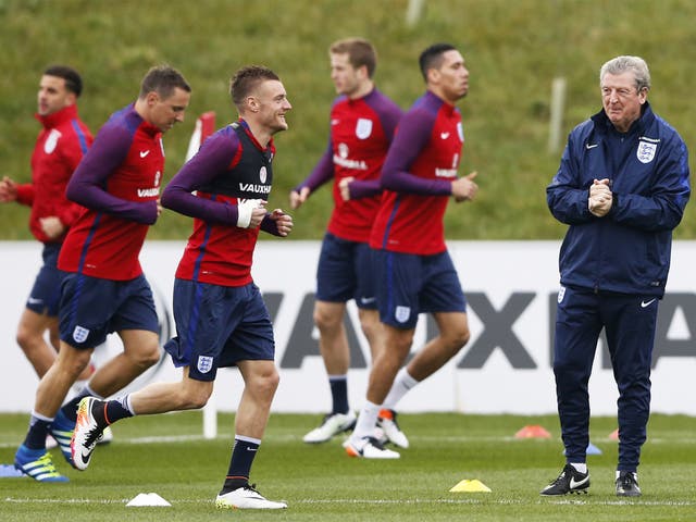 England manager Roy Hodgson watches Leicester striker Jamie Vardy during training at St George’s Park