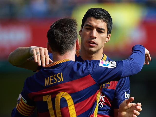 Lionel Messi and Luis Suarez