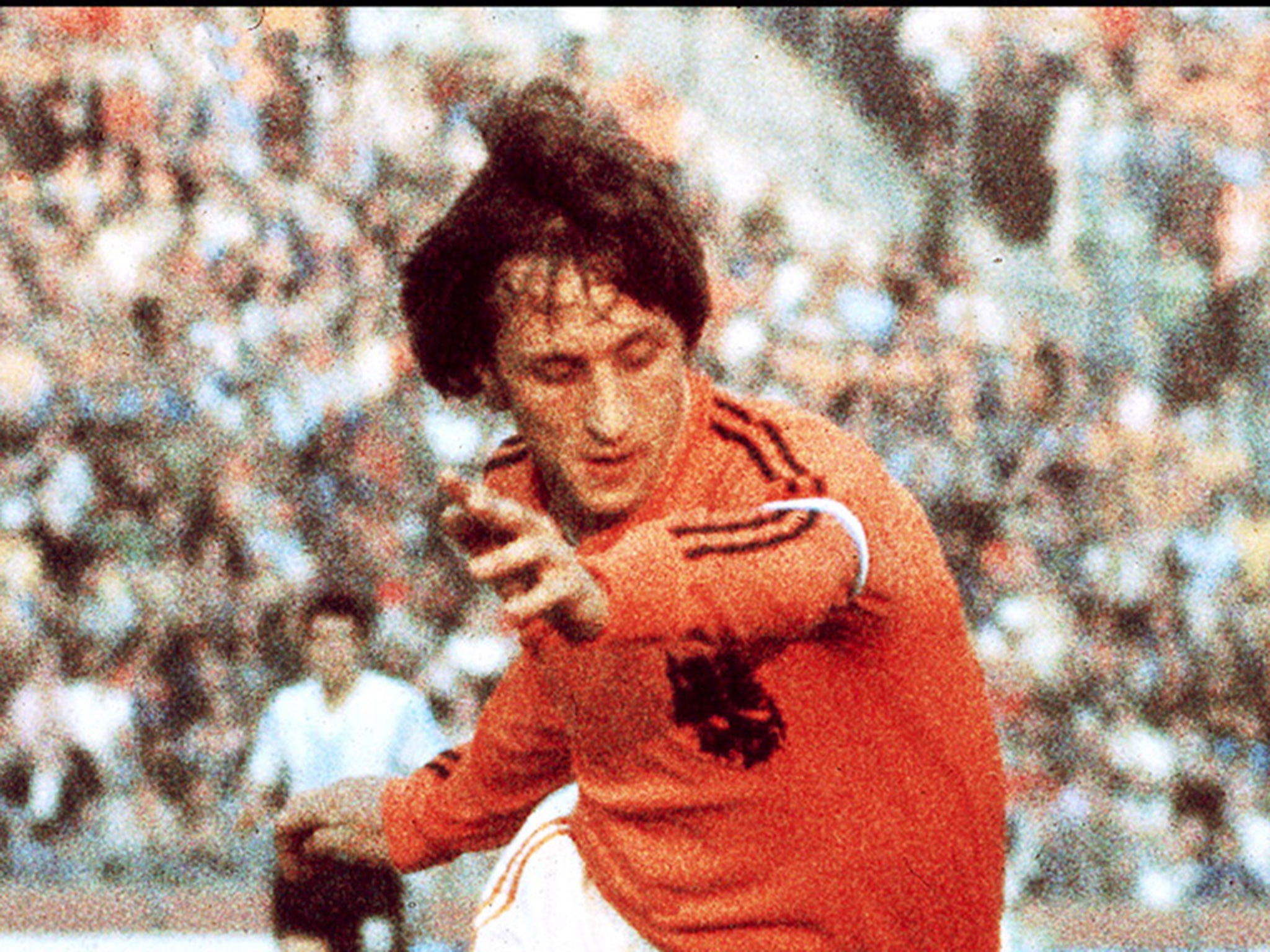 Johan Cruyff pictured wearing his two-striped shirt during the 1974 World Cup