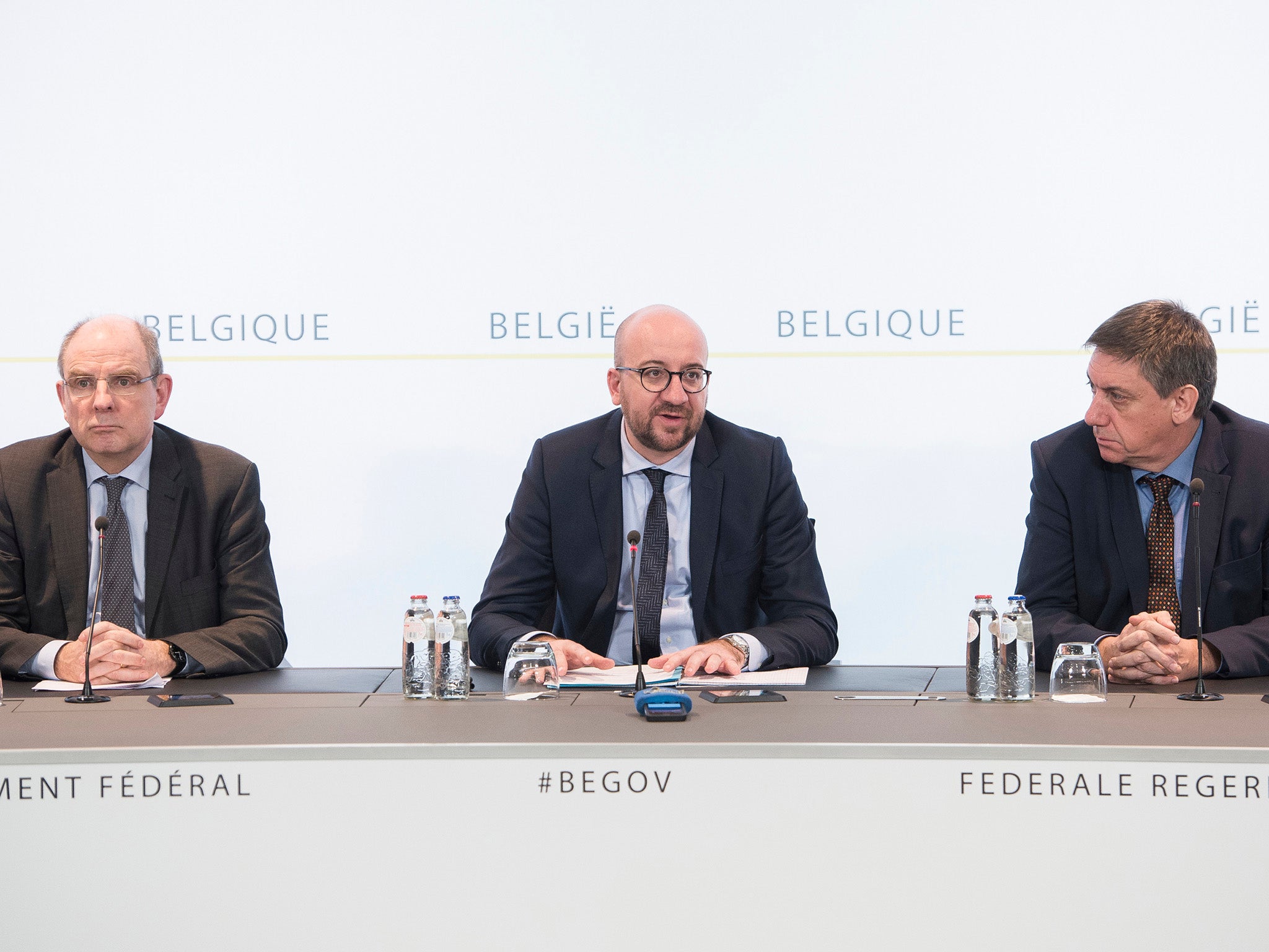 (L to R) Belgian Justice minister Koen Geens, Belgian Prime Minister Charles Michel and Vice-Prime Minister and Interior minister Jan Jambon