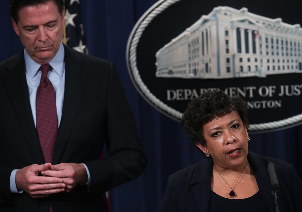 FBI director James Comey, standing behind US Attorney General Loretta Lynch, apparently ignored warnings from the justice department about going public