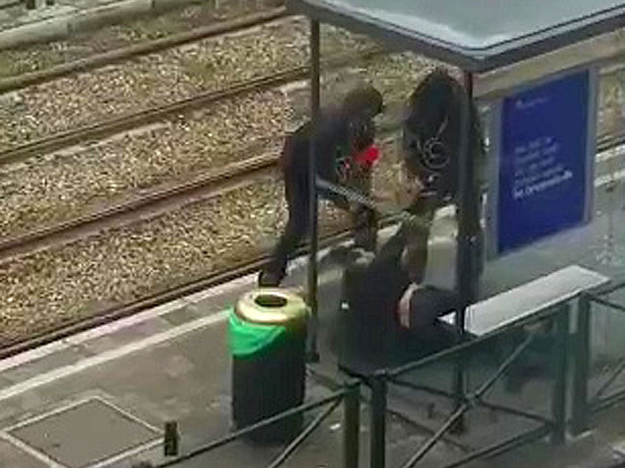 Belgian police were filmed dragging the shot suspect along a tramway platform in Schaerbeek, Belgium, March 25, 2016.