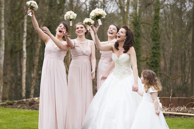 Bridesmaids traditionally wear similar or identical dresses
