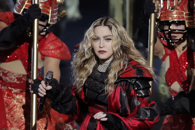 Madonna has settled her custody battle with Guy Richie out of court, with her son Rocco remaining in the UK