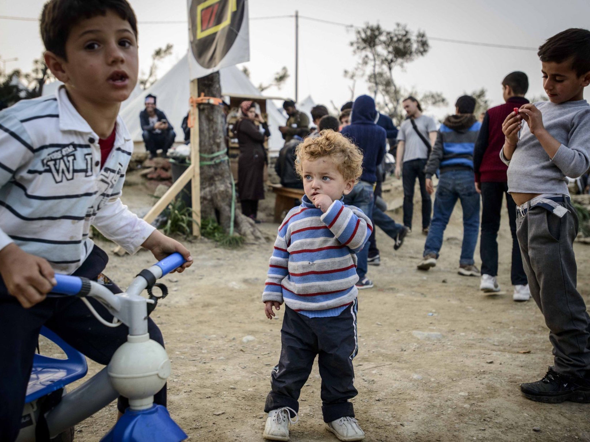 Children at Lesbos' Moria camp, which is guarded by police. Since the deal refugees are picked up by the coastguard and taken to the site