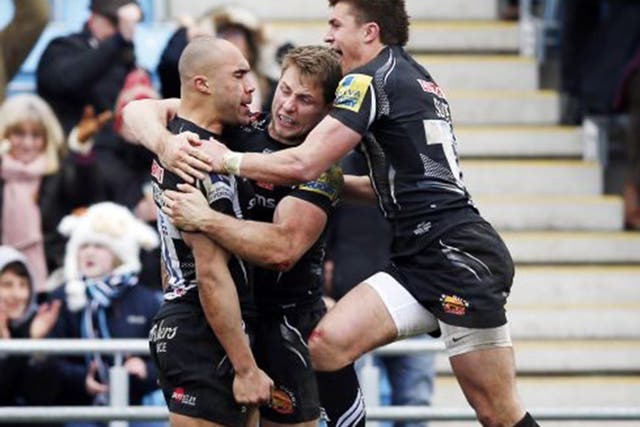 Olly Woodbury receives the congratulations of his Exeter Chiefs team-mates after scoring against Northampton in last week’s win