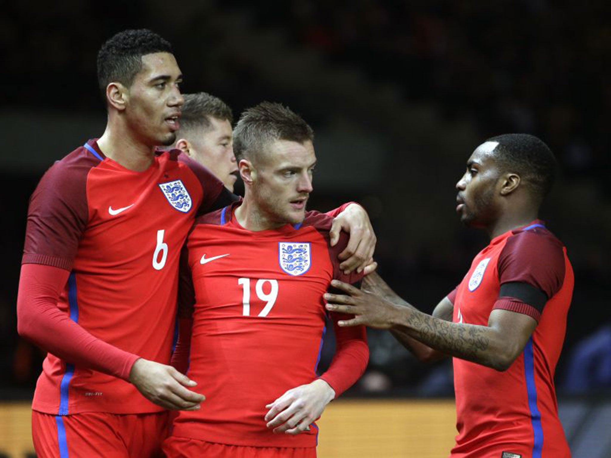 Jamie Vardy, centre, drew England level at 2-2 with a neat finish