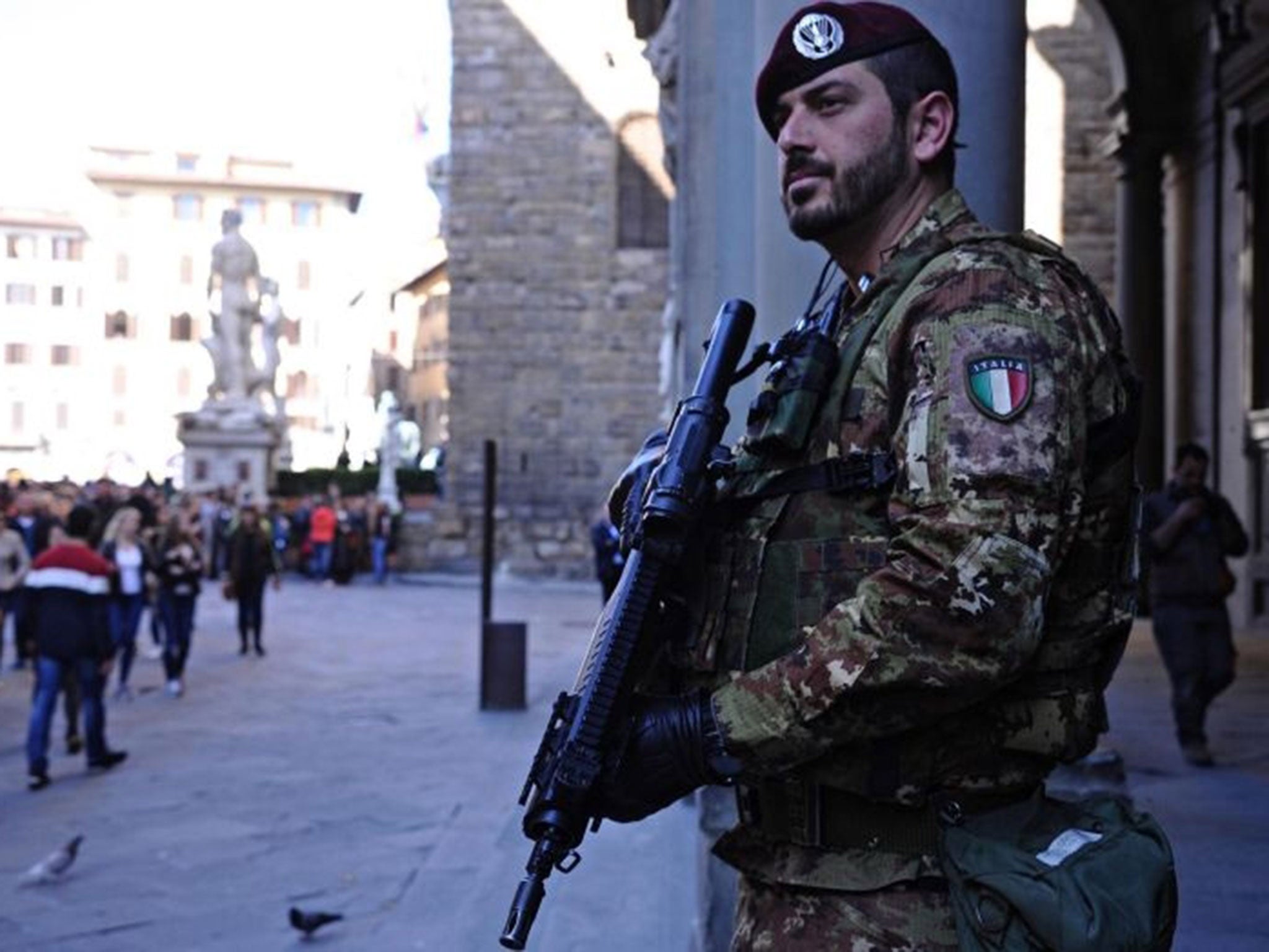 A soldier stands on the Signoria and Uffizi Museum square in Florence, Italy, 25 March, 2016