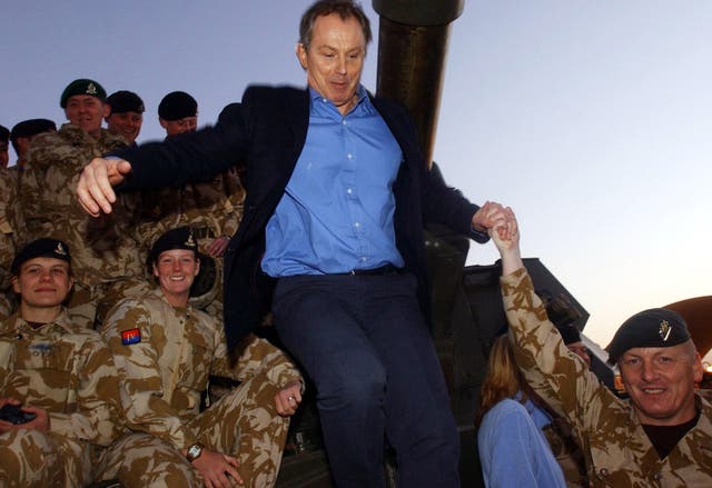 Tony Blair with British soldiers in Baghdad during the Iraq War