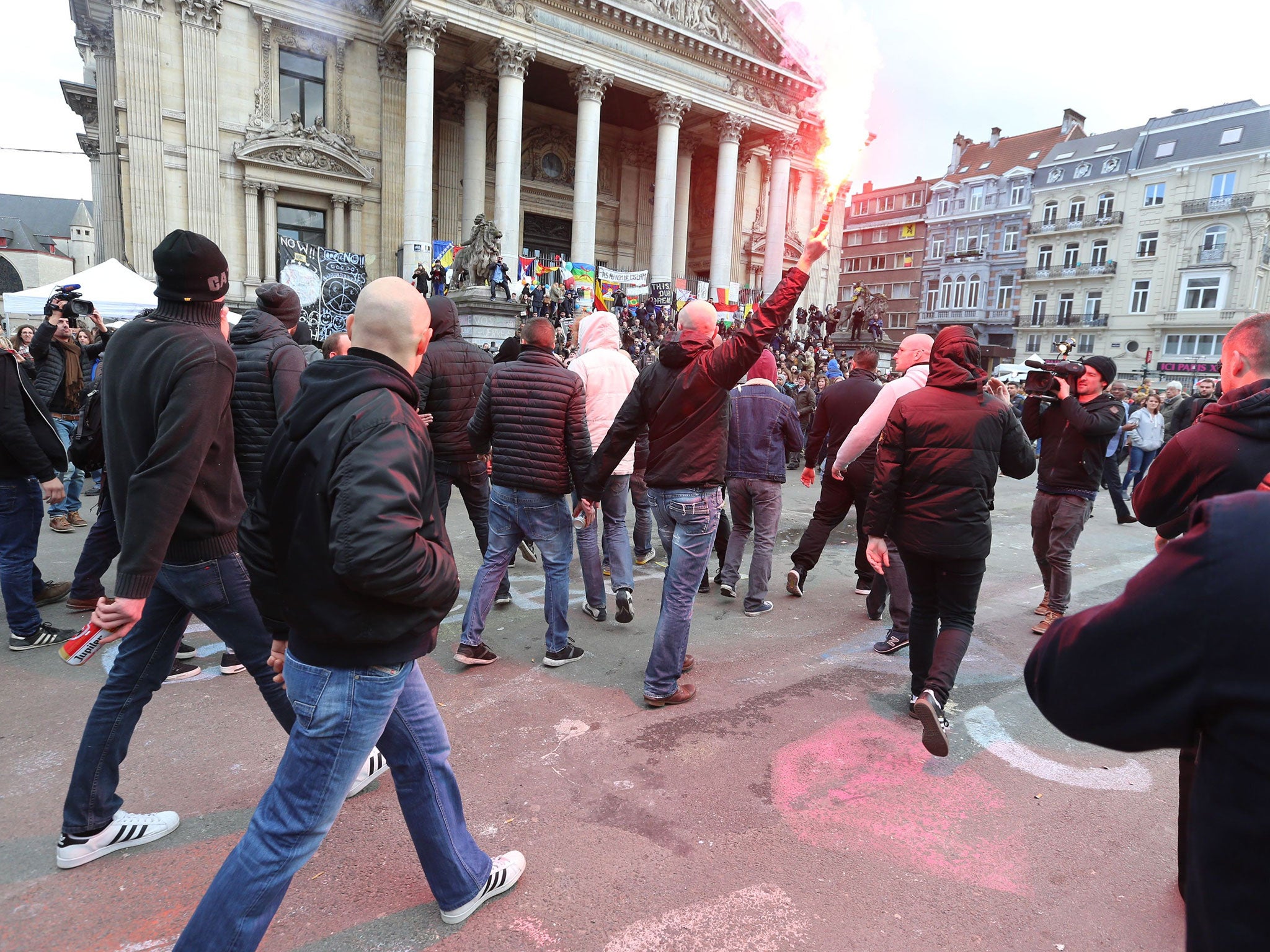 Protesters disturb the peace rally at Place de la Bourse