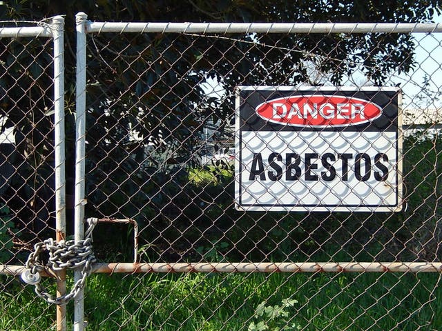 Government policy does not require schools to remove asbestos unless it is disturbed