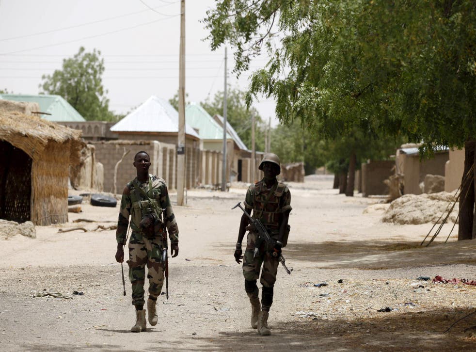 Nigerian soldiers after retaking Damasak from Boko Haram in March 2015