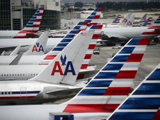 ‘Chaos’ as 'drunk co-pilot is handcuffed and escorted off' American Airlines' flight 