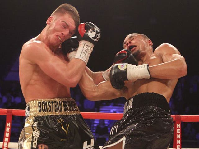 Nick Blackwell, left, and Chris Eubank Jnr exchange blows during their brutal title fight on Saturday night