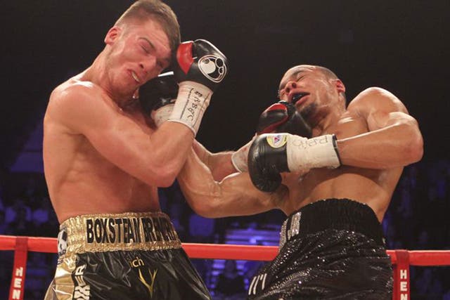 Nick Blackwell, left, and Chris Eubank Jnr exchange blows during their brutal title fight on Saturday night