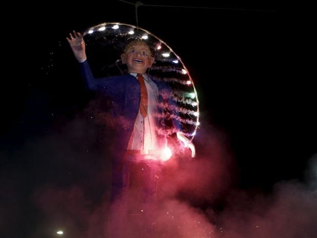 Mexicans burn an effigy of U.S. Republican presidential hopeful Donald Trump as they celebrate an Easter ritual